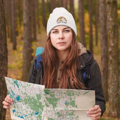Just Climb Rock Climbing beanie of a woman at the woods with a map