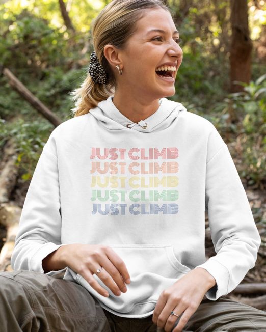 Just Climb Retro Hippie Rock Climbing-pullover hoodie featuring a happy smiling blonde woman in the woods