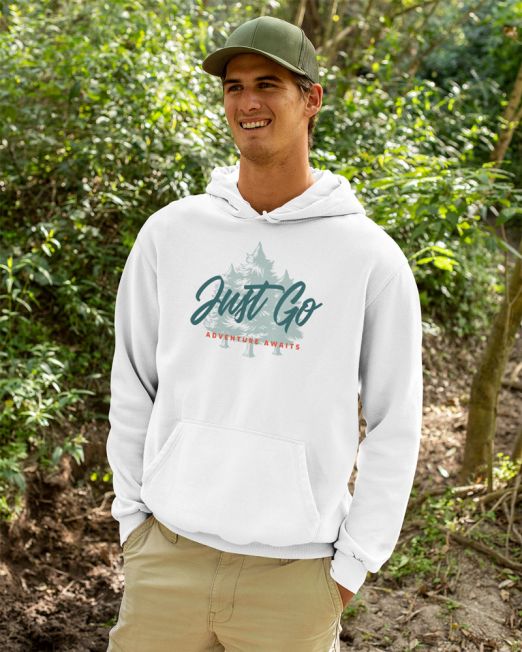 Just Go Adventure Awaits Travel and Nature Design of a happy man wearing a hoodie in the woods